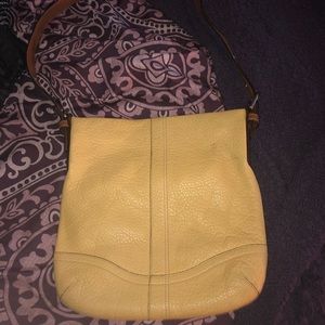 Butter yellow Coach purse crossbody